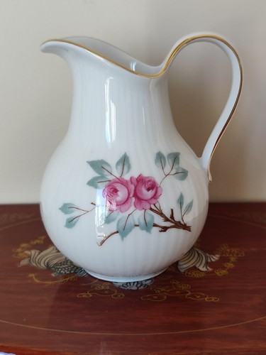 Pot lait porcelaine de - à,