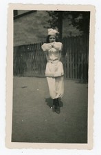 PHOTO snapshot 1942, a woman in white suit dance Russian choreography