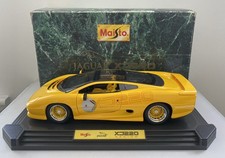 Maisto 1:12 Scale Jaguar XJ220 Rare Yellow On Stand 33201 Boxed