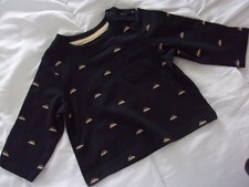 J23 Vêtement d'occasion