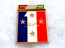 Un insigne militaire " 1er