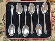 Cased Art Nouveau atomic motif silver teaspoons, Sheffield 1932
