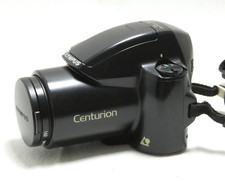 OLYMPUS CENTURION APPAREIL PHOTO ARGENTIQUE 25-100 ZOOM FLASH LENS HQ D-1.45X