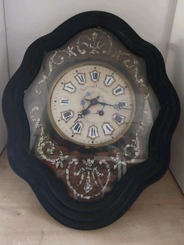 Pendule horloge oeil de - ,