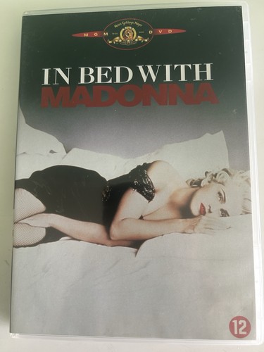 Bed with madonna dvd - in,