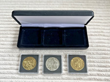 3 médailles Johnny Hallyday Monnaie de Paris : Croix du Rocker - Moto - Guitare