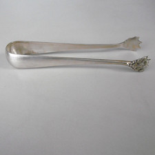 pince a sucre en metal argente