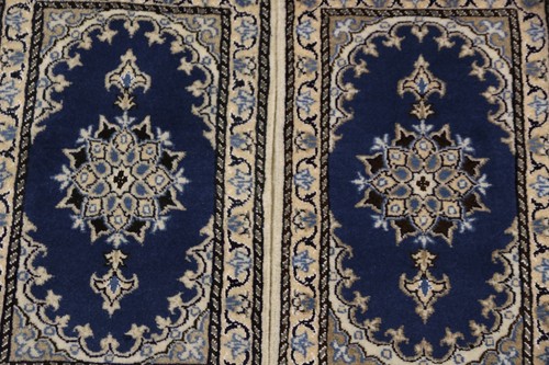 Tapis oriental noué à - x,