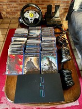 Console PS2 avec manettes