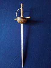 Coupe papier en forme