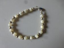 fond de stock bracelet  perle en nacre+ perle métal long 18 cm + médaille bleue