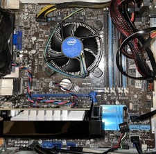 Carte mère asus+ram+processeur intel+disque dur+alimentation+quelques câbles