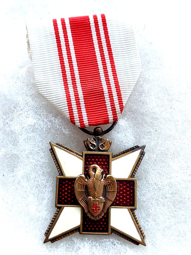 Une médaille belge - une,