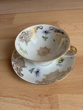 Tasse et soucoupe en porcelaine fine GKC Bavaria, décor floral et dorures
