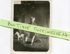 PHOTO OF A BOY WITH HIS WOODEN TOYS ROCKING HORSE WHEELBARROW PLANE