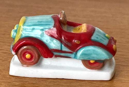 Fève voiture pédale rouge - à,