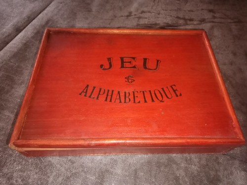 Jeu alphabétique lettre - , &