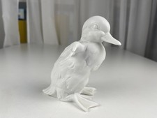 Statuette canard en porcelaine
