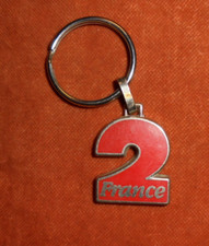 Nice enamelled metal keychain - FRANCE 2 TV channel (France Télévisions)