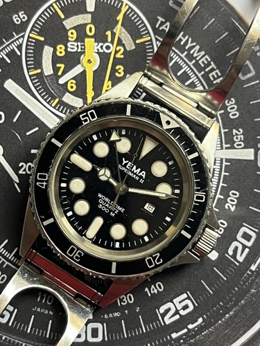 Montre yema superman - -, ii