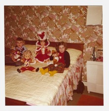 Kids Strange Dolls Sitting Bed