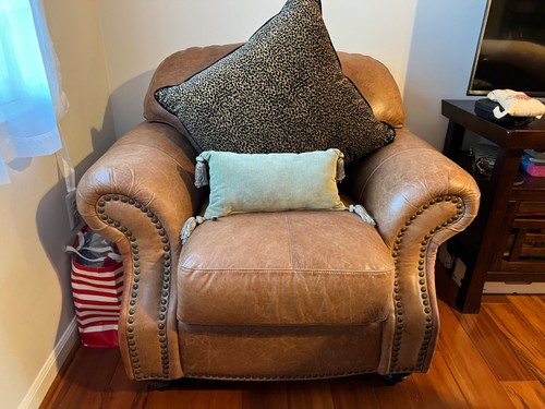 Used sealy brown leather sofa - used,