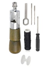 Machine à coudre à la main