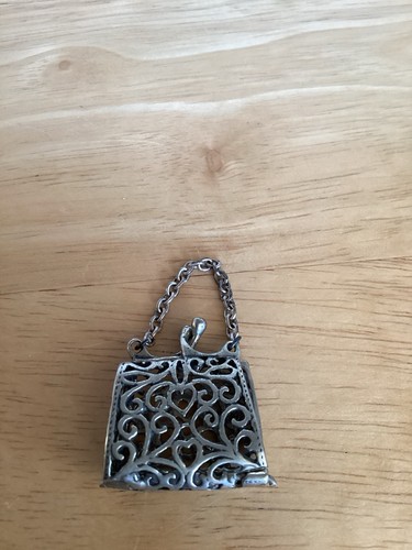 Miniature siver handbag with - siver,