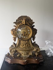 Ancienne pendule dorée du