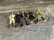 Five Star Wars Figurines With Extra Light Sabers