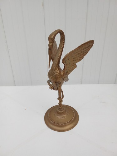 Héron bronze doré - doré, tenant
