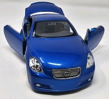 JADA DUB CITY 1/24 LEXUS SC430  (Candy Blue) W/Cartelli Rims