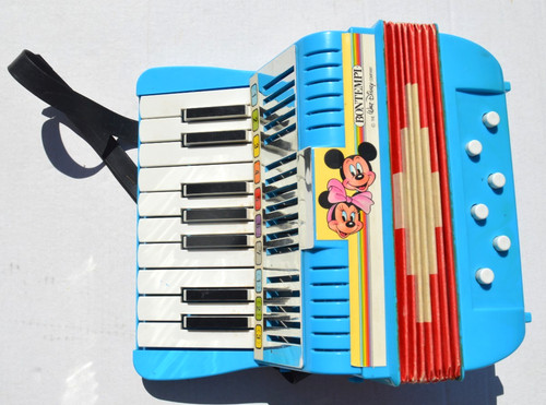 Accordeon jouet - /, →