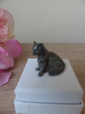 Figurine chat assis miniature