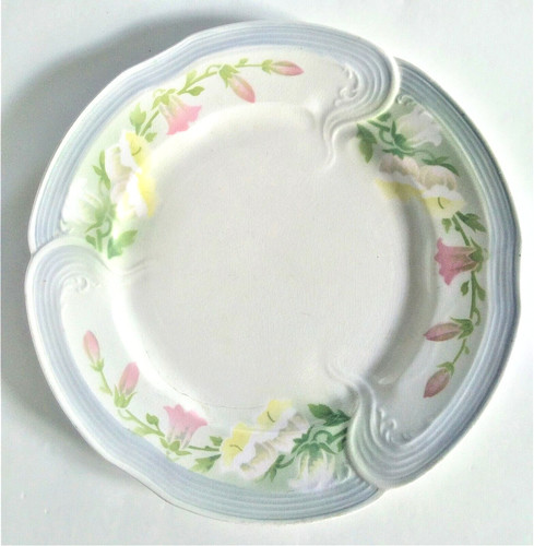 Assiette ancienne barbotine