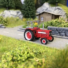 Tracteur Mc-Cormick INTERNATIONAL HI 624, avec arceau de sécurité et lame de cou