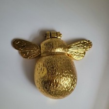 Frappe de porte abeille en