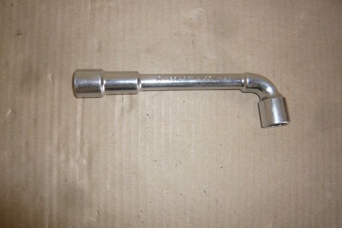 Clé pipe débouchée - a,