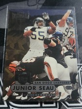 JUNIOR SEAU 1998 Metal Universe #121.  CHARGERS