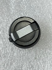 Bouton de rembobinage original