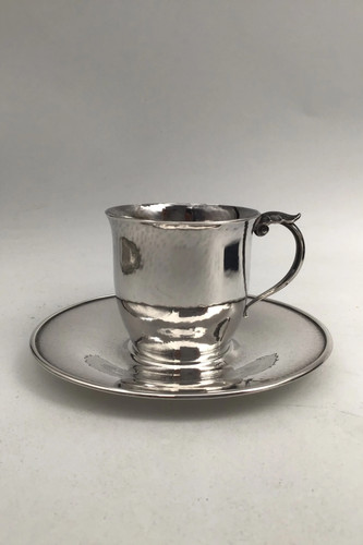 Tasse soucoupe en argent - /,