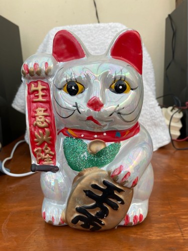 Chat tirelire porte bonheur