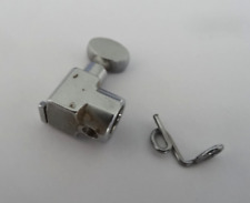 Serre-aiguille Machine à