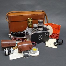 Bolex Paillard H8 camera with accessories, documents and leather bag. Good