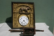 horloge XIX ème cuivre et bois.