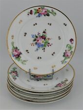 6 Paris porcelain plates, 19th century, decor of flowers and gilding.