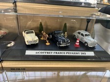 Coffret avec 3 Peugeot 203 en