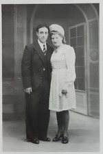 Wedding photograph man woman - costume, dress, hat fashion April 1945