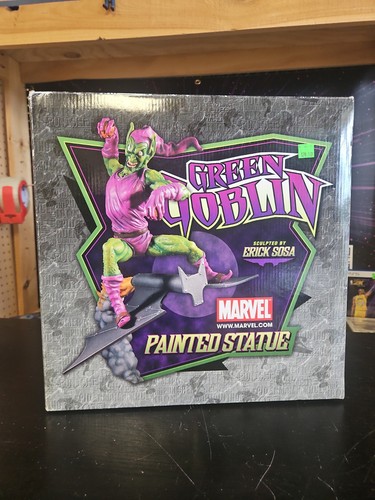 Green goblin painted statue