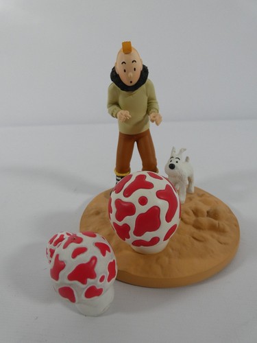 Une statuette tintin et - une,
